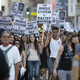 Protesters angry about the acquittal of George Zimmerman in the death of black teen Trayvon Martin march through the streets of downtown Los Angeles in July 2013.
ROBYN BECK/AFP/Getty Images